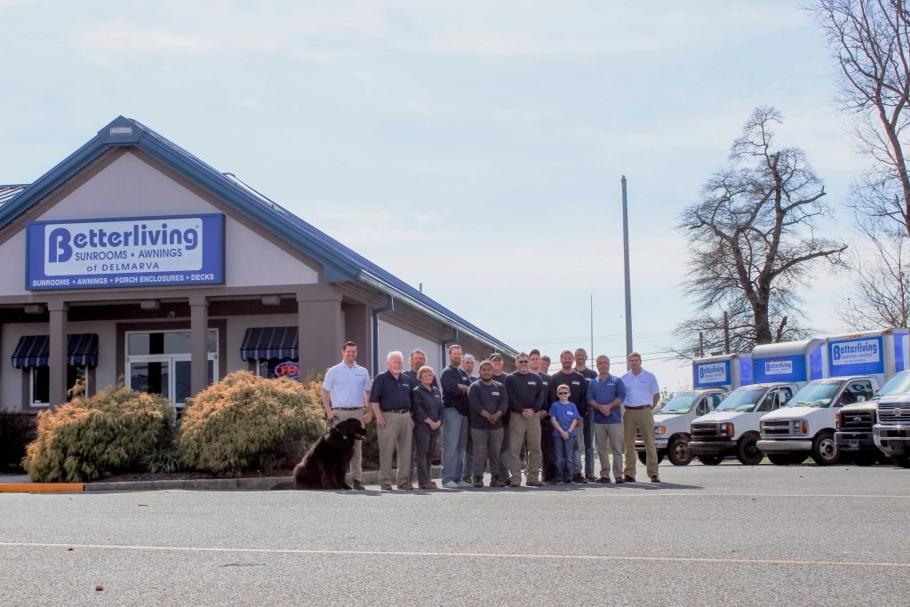 staff of betterliving delmarva gathering for group photo in front of business